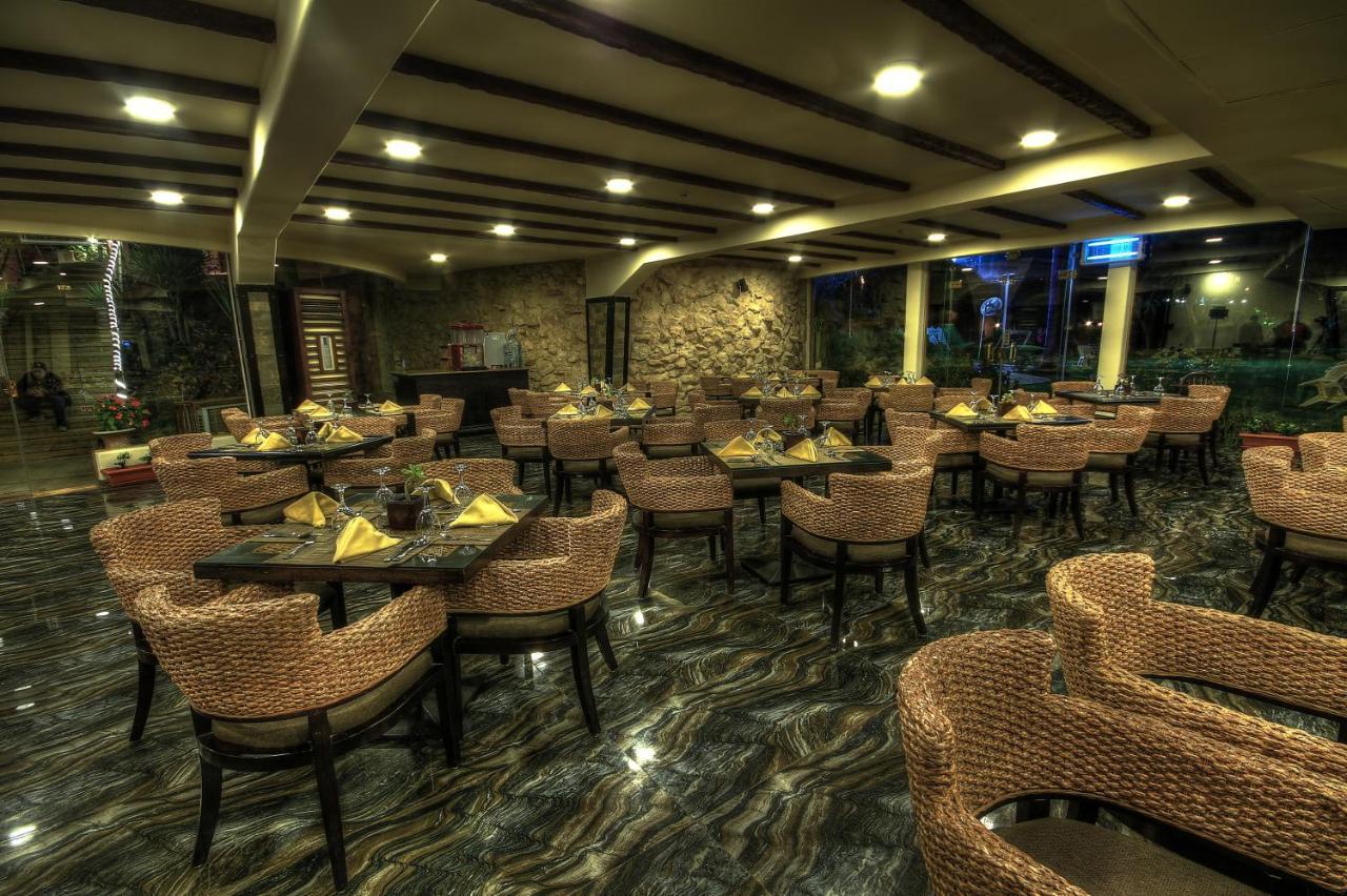 Africana Hotel & Spa Qaryat Shakush Bagian luar foto
