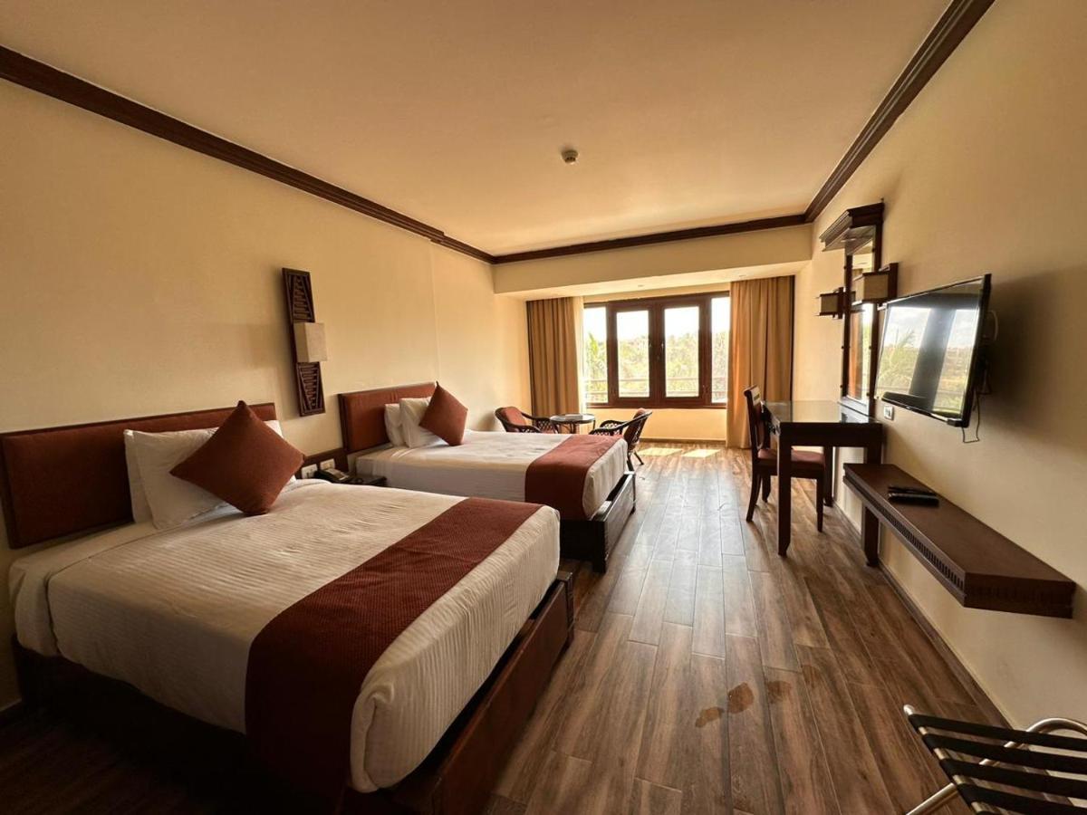 Africana Hotel & Spa Qaryat Shakush Bagian luar foto