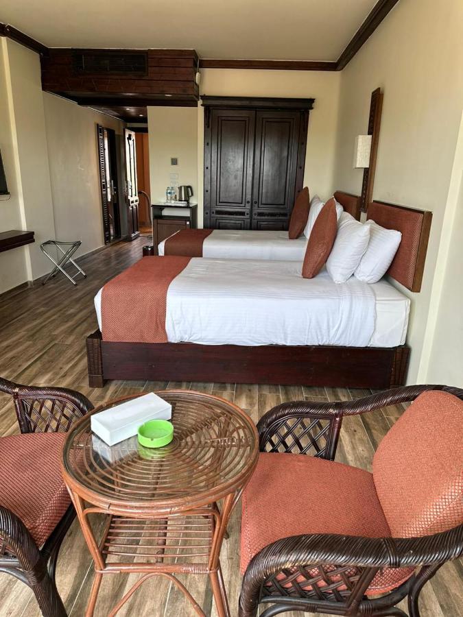 Africana Hotel & Spa Qaryat Shakush Bagian luar foto