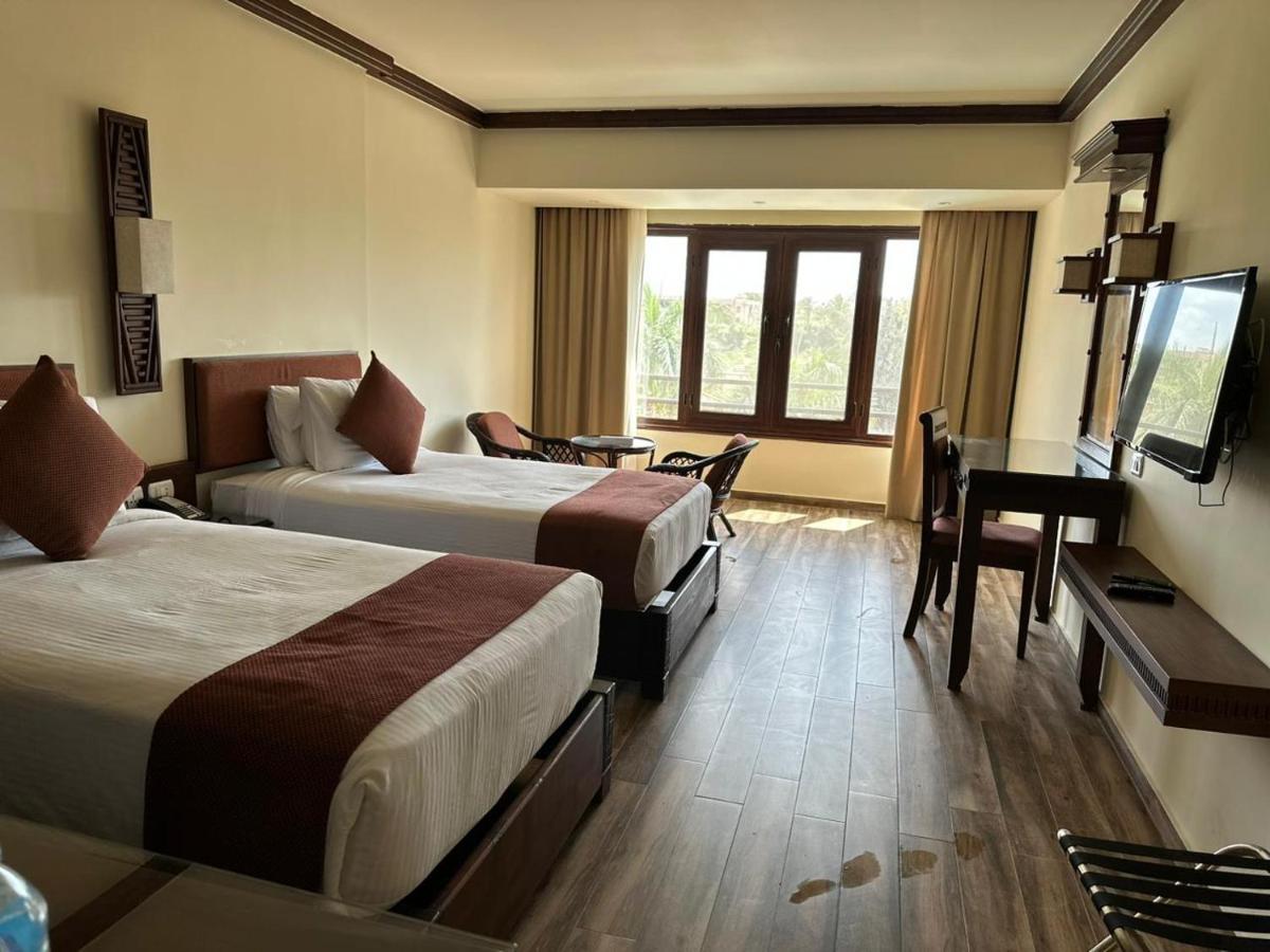 Africana Hotel & Spa Qaryat Shakush Bagian luar foto