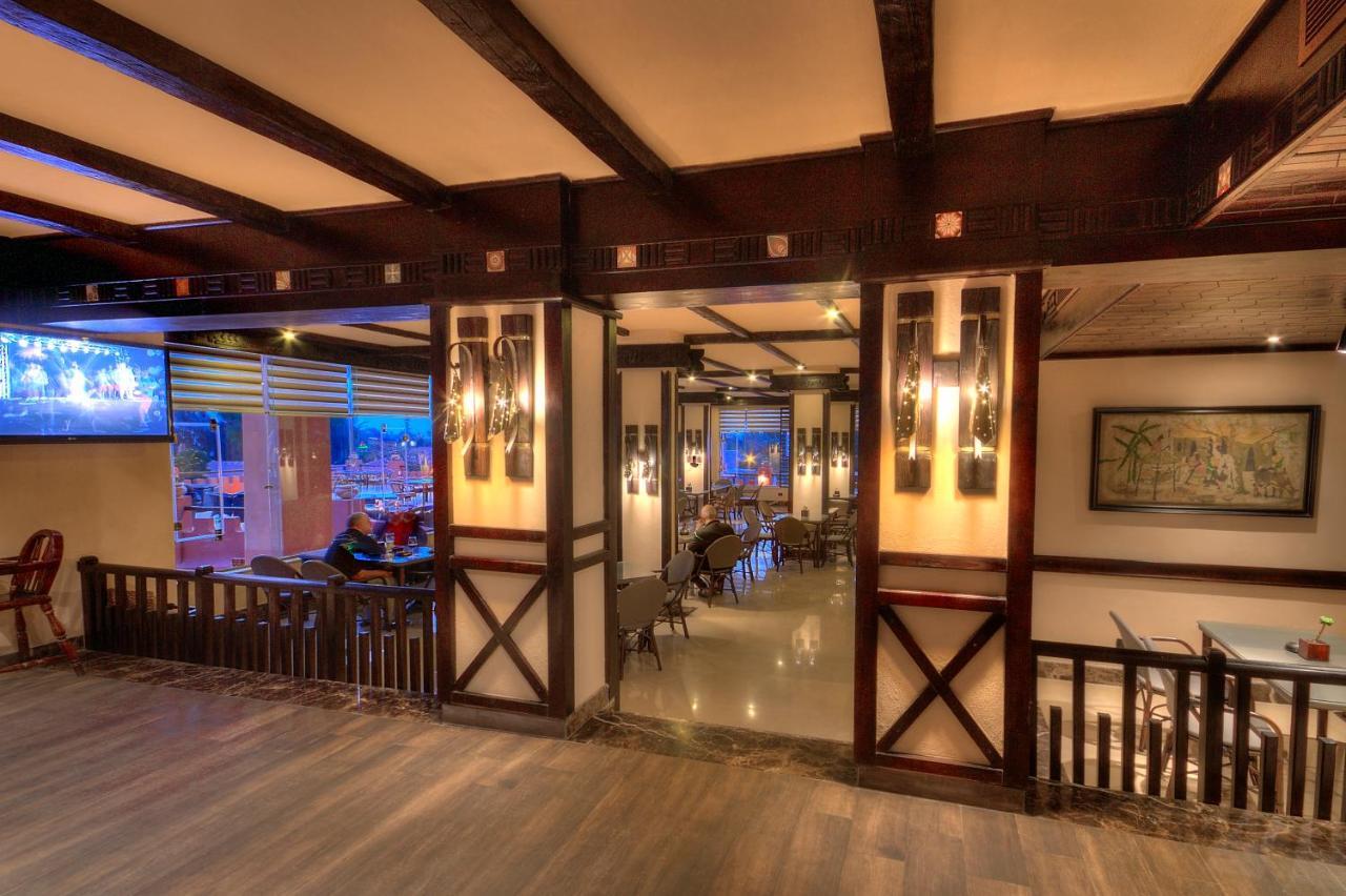 Africana Hotel & Spa Qaryat Shakush Bagian luar foto