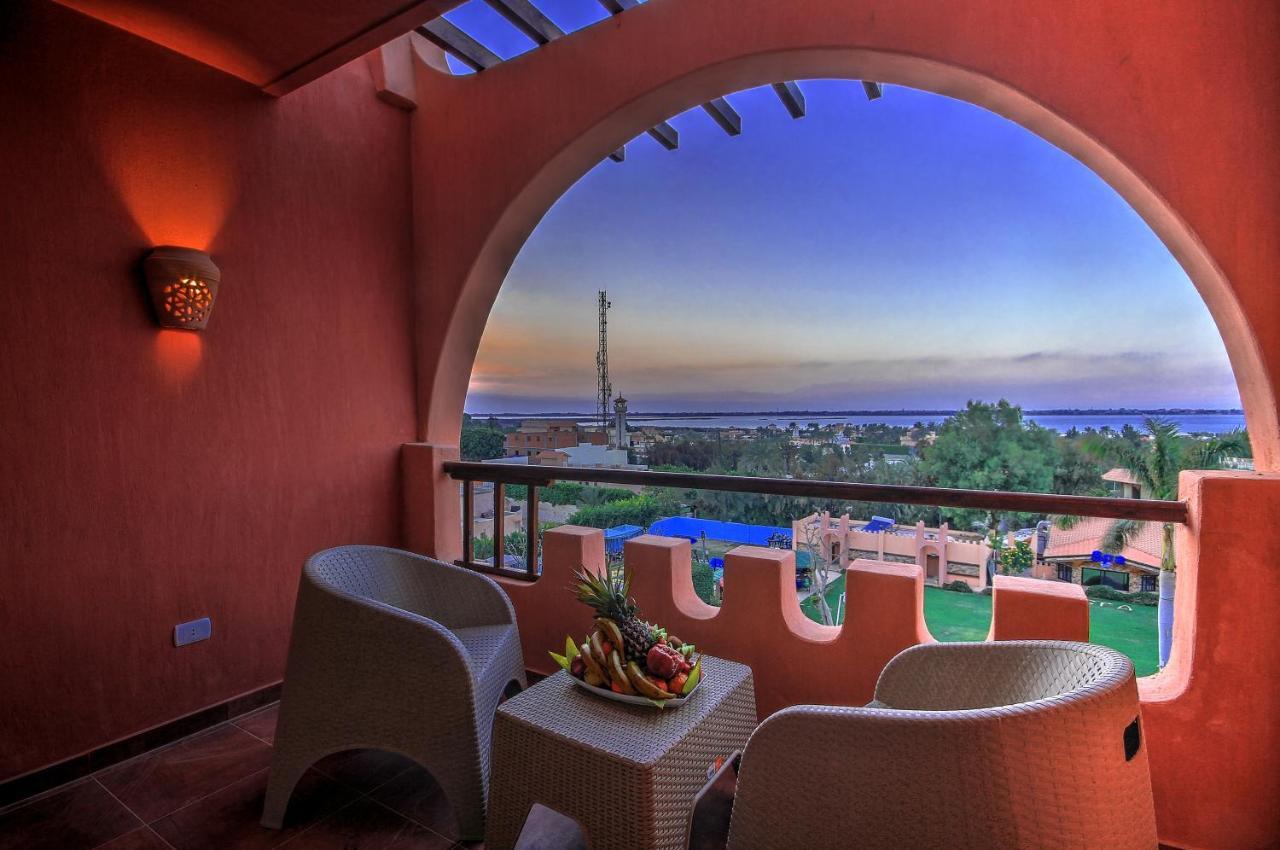 Africana Hotel & Spa Qaryat Shakush Bagian luar foto